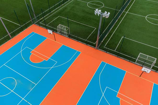 Learn about multi-sport court cost, pricing ranges, core design factors, and configuration options to help you plan a court that fits your space and goals.
